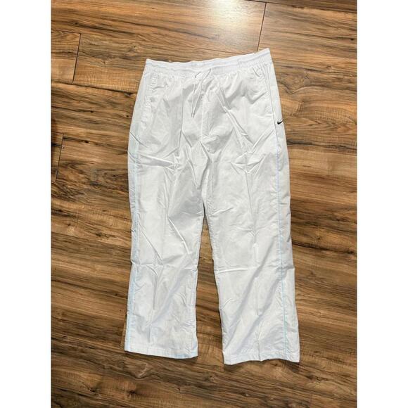 Nike Windrunner Women's High-Waisted Woven Open-Hem Pants - Picture 1 of 5